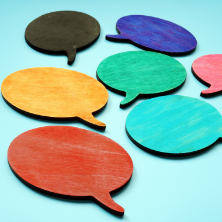 Image of multicolor wooden speech bubbles. 