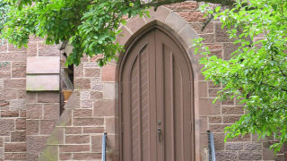 A photo of Msgr. John Radano.Chapel of Immaculate Conception door.