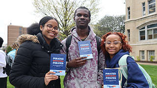 Students posing for a photo on Giving Day.