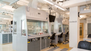 Celebrating the dedication of the new multi-purpose collaborative suite of laboratories in McNulty Hall 116.From left, Professors Stephen Kelty, Cosimo Antonacci, James Hanson, Gregory R. Wideman and Reverend Gerald Buonopane celebrate the arrival of the high-tech equipment.New Chemistry Lab