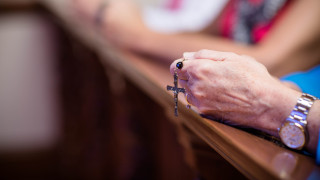 Photo of person praying.