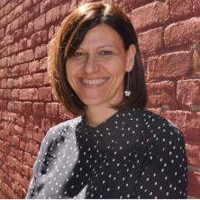 Roberta Scortechini wearing black blouse posing