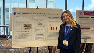 Alyson O'Neill, a Petersheim Travel Award recipient and Seton Hall social work alumnus, presenting her research project