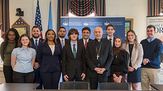 archbishop-caccia-with-students