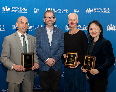 Professors Gingerelli, Robinson, and Chen with Dean Crable.