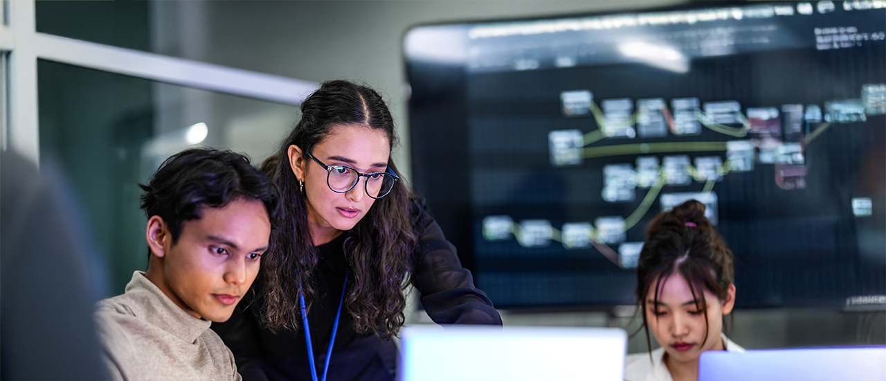 Computer engineers over laptop