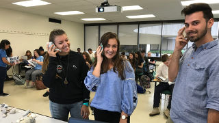 Ecology club holding seashells