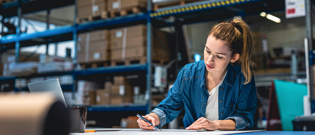 Student working in a warehouse.