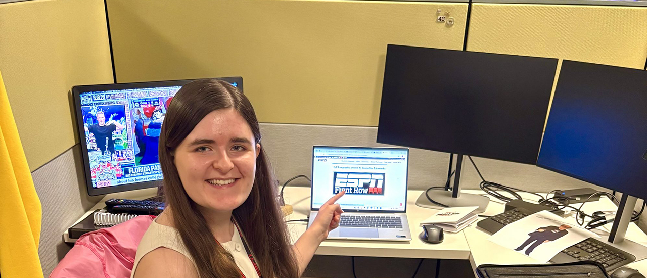 A student working on a project with ESPN.