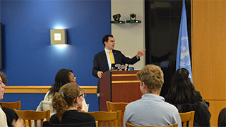 Lash speaking in Chancelor's Suite