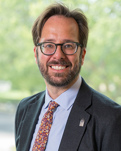 A headshot of SHU professor Jonathan Farina