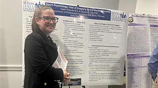 Kaitlin Pasinski presenting on 'Sport Psychology: Use of Imagery by Ice Hockey Goalies'