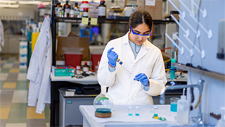 a Student doing hands-on laboratory research