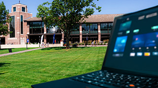 Seton Hall campus with laptop