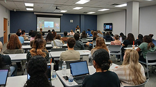 Lili Zeng giving a lecture at Seton Hall