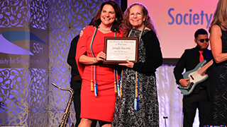 Jennifer McCarthy (left) with Dawn Shocken, chair of the SSH Academy, during McCarthy’s induction as a Fellow in the Society for Simulation in Healthcare at the International Meeting on Simulation in Healthcare in San Antonio, TX.