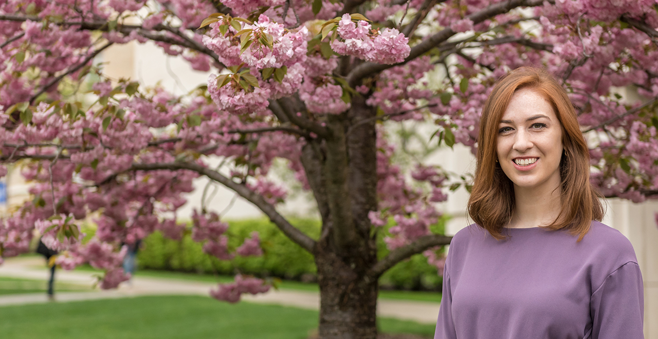 Siobhan McGirl standing on the University Green on the Seton Hall campus.