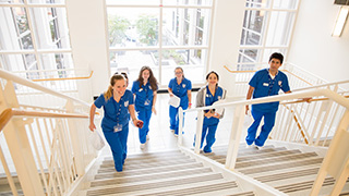 nursing students on the stairs