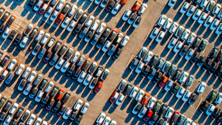 A parking lot full of cars.