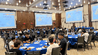 students sitting on round tables at Pre-Med event