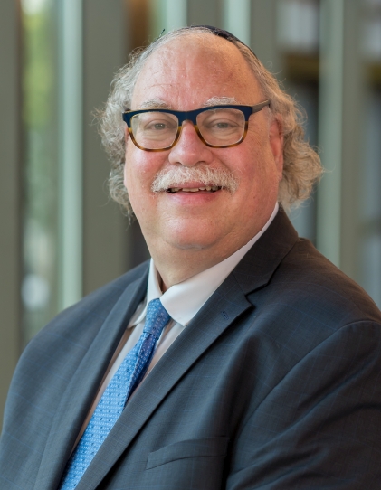 A headshot of Rabbi Alan Brill