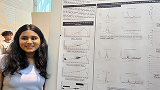 Student Reva Pavithran pictured at the Petersheim Symposium presenting research.