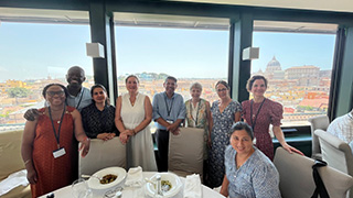 Rome conference group having lunch