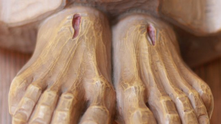 statue-jesus-feetx320 A photo of Jesus on crucifix