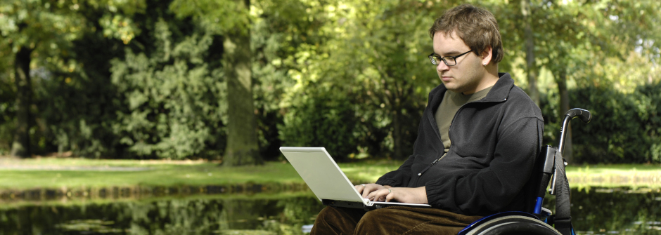 Student in wheelchair on laptop