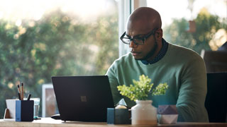 A professor using Teams remotely.