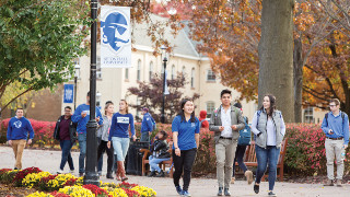 Students walking on campus. 